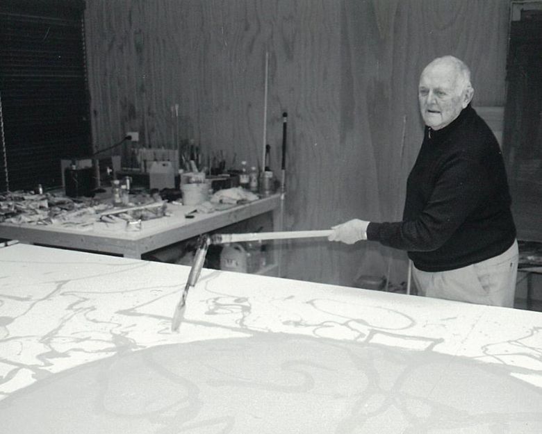 Artist John Olsen working on a large painting
